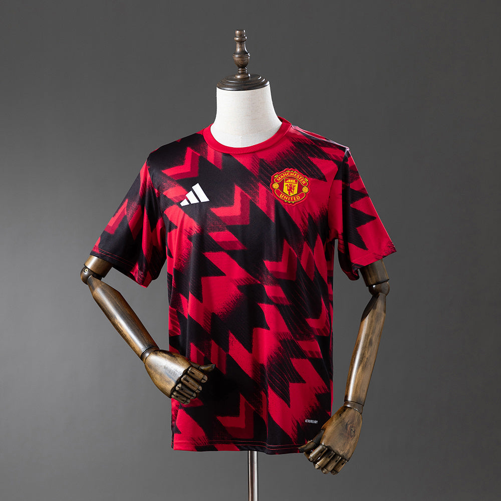 MANCHESTER UNITED CALENTAMENTO I 25/26 HOMBRE