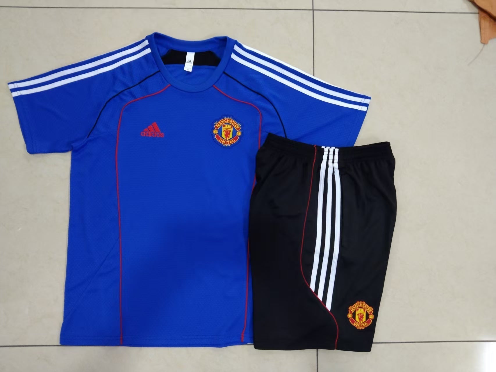 CAMISETA + PANTALONES MANCHESTER UNITED VI 25/26